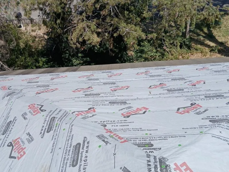 Slide of AT Max Roofing