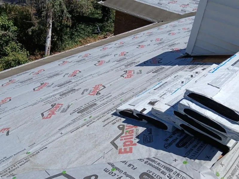 Slide of AT Max Roofing