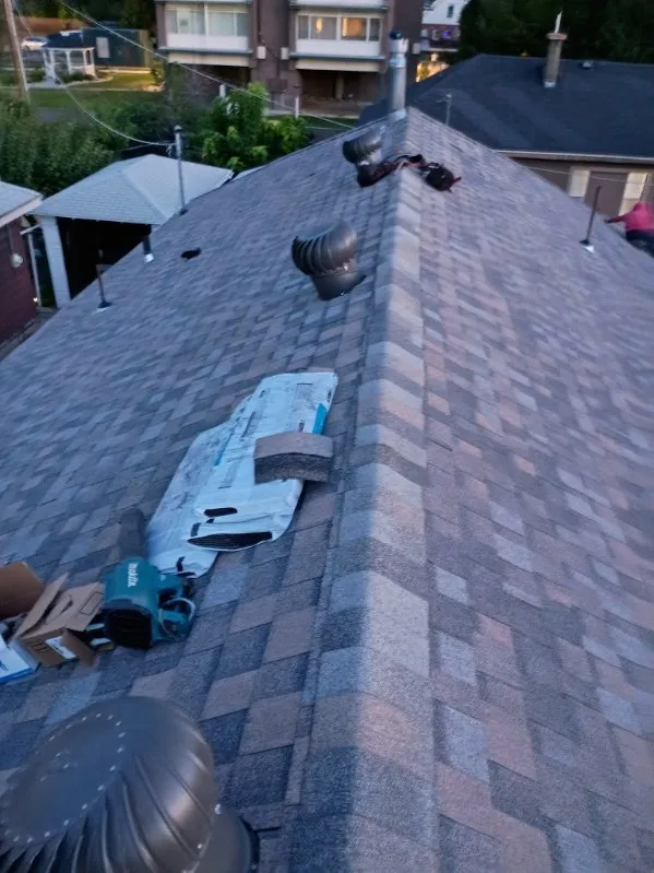 Slide of AT Max Roofing