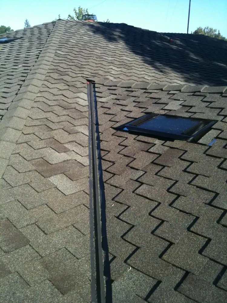 Slide of At the Top Roofing