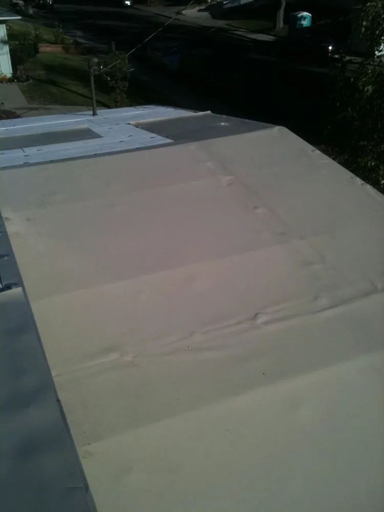 Slide of At the Top Roofing