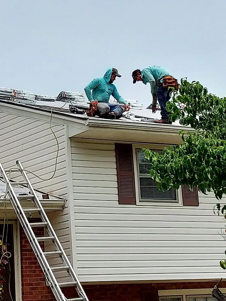 Slide of At Top Roofing & Painting