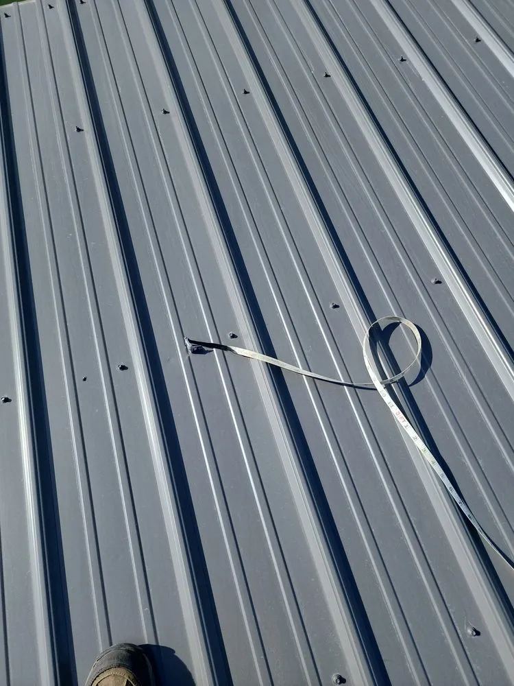 Slide of At Ur Top Roofing