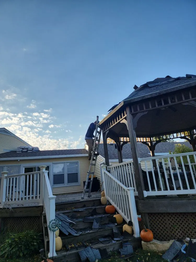 Slide of At Ur Top Roofing