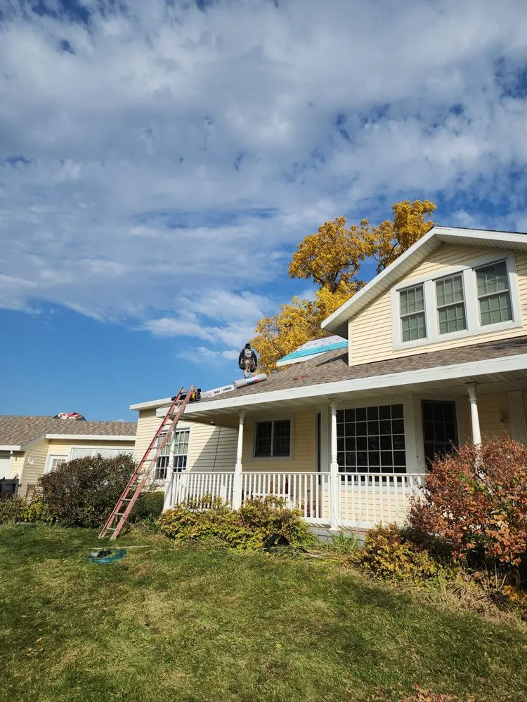 Slide of At Ur Top Roofing