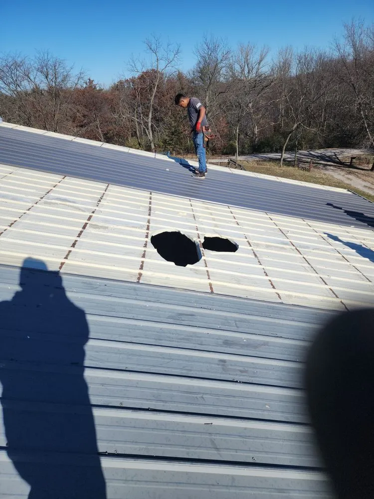 Slide of At Ur Top Roofing