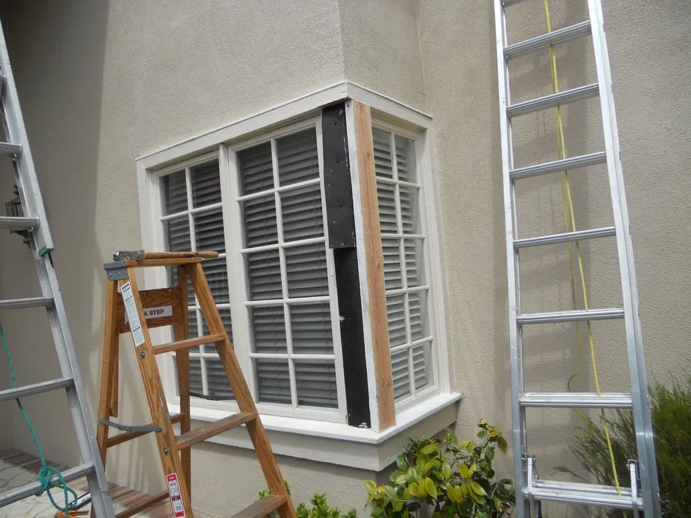 Slide of Atkins Roofing