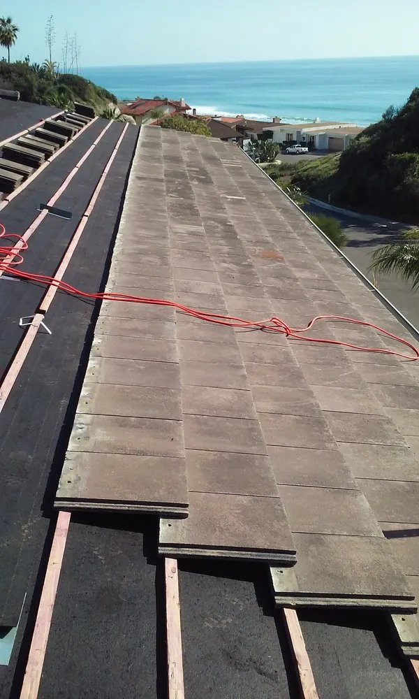 Slide of Atkins Roofing