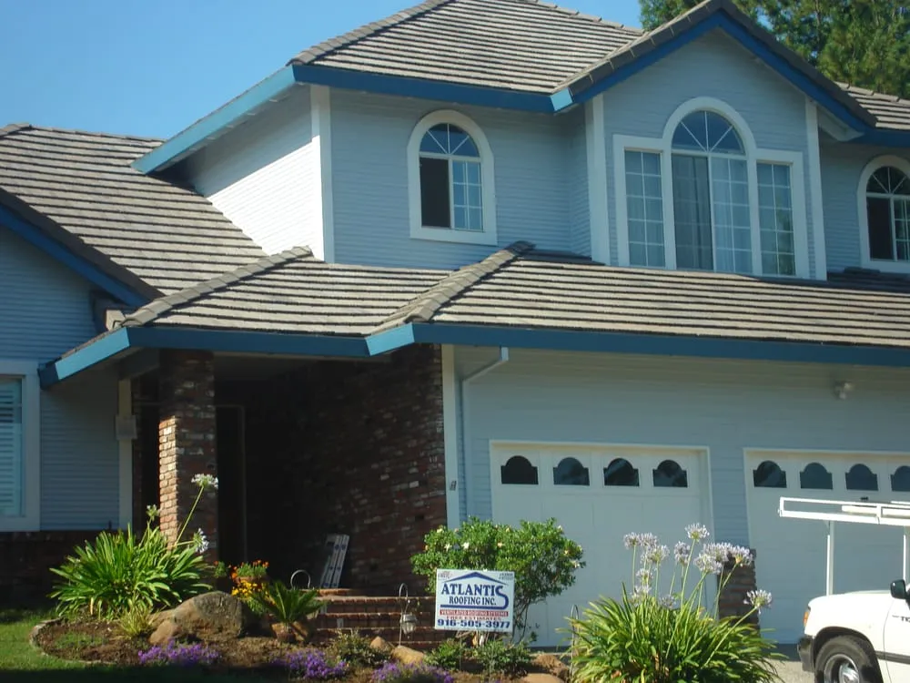 Slide of Atlantis Roofing