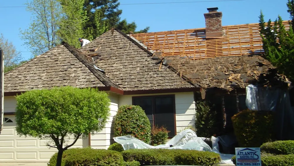 Slide of Atlantis Roofing