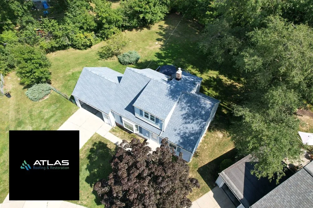 Slide of Atlas Roofing & Restoration