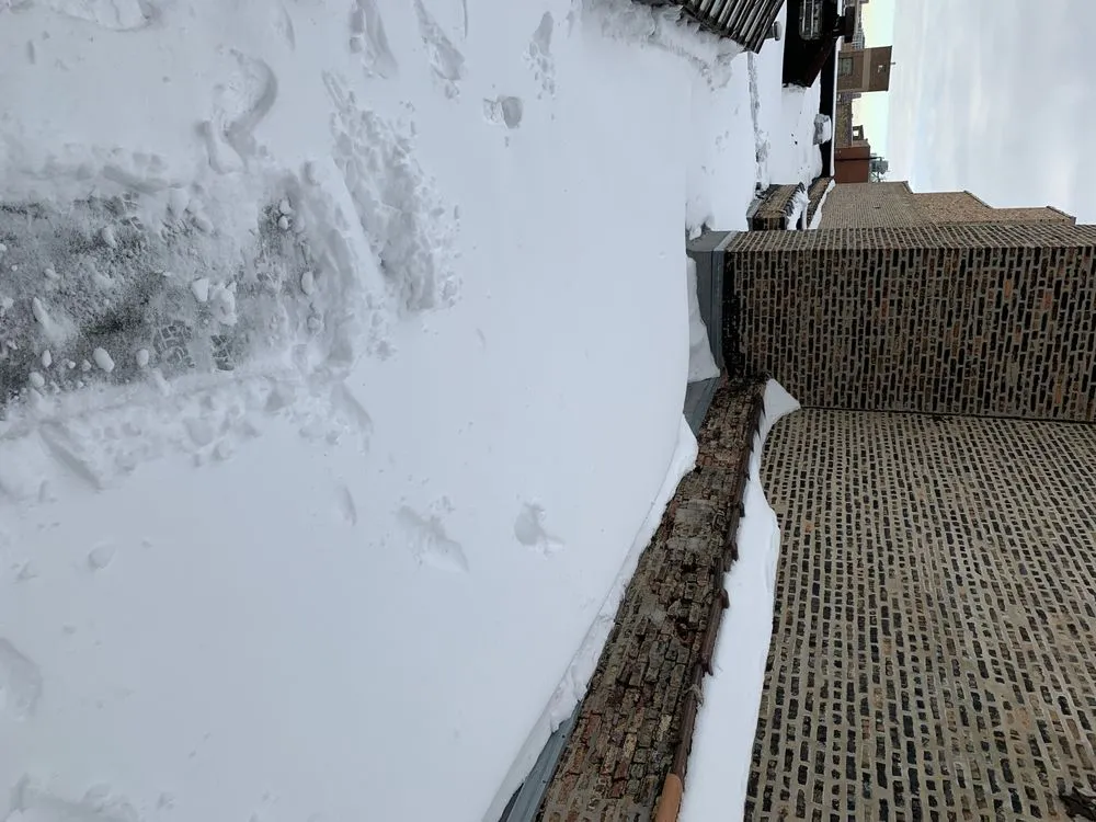 Slide of Atlas Roofing Construction