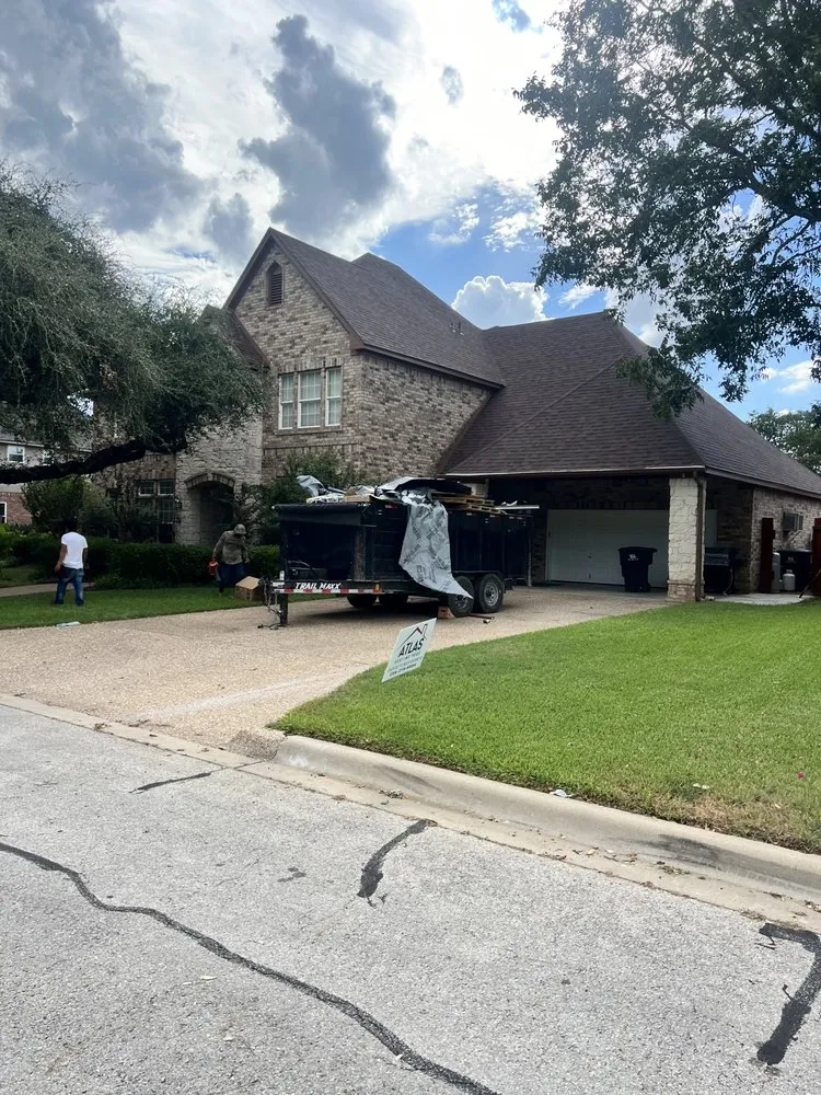 Slide of Atlas Roofing Pros