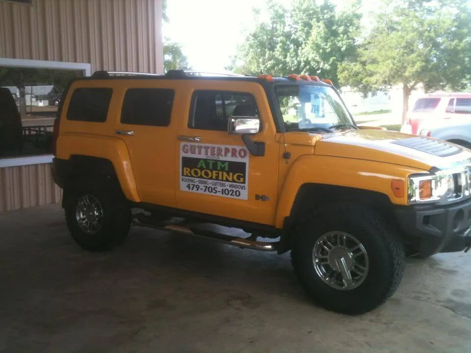 Slide of ATM Roofing & Construction