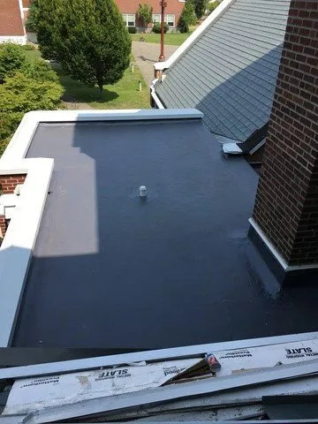 Slide of Atrax Roof & Gutter