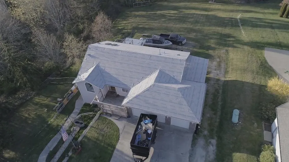 Slide of Atrax Roof & Gutter