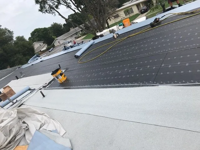 Slide of Augusto Roofing