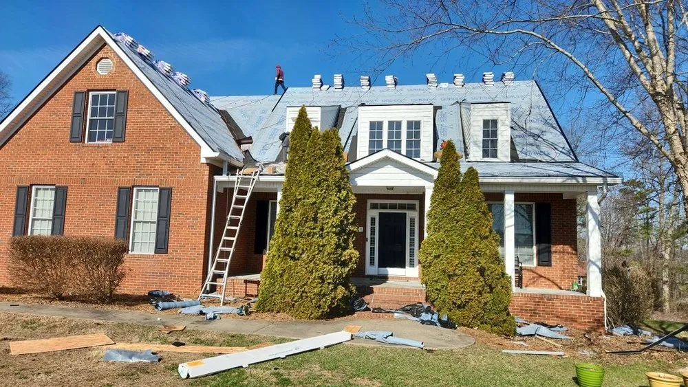 Slide of Aultman Roofing