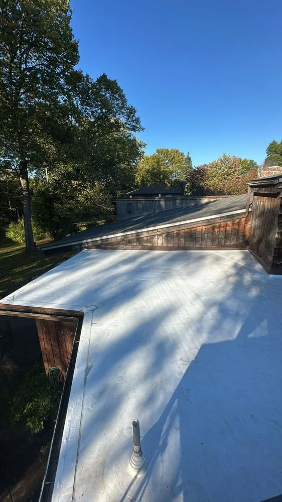 Slide of Aurora Roofing & Restoration