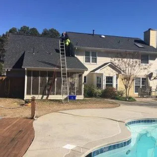 Slide of Austin's Roofing and Gutters