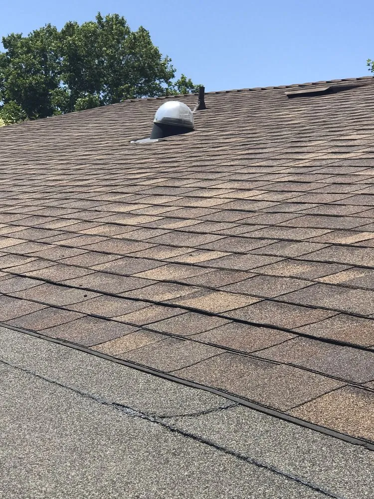 Slide of AV Roofing & Construction