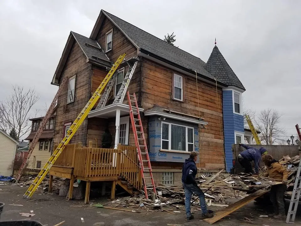 Slide of AVA Roofing & Siding