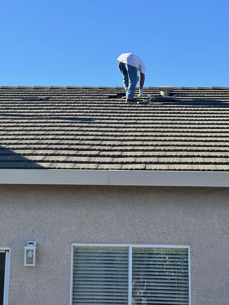 Slide of Avila Roofing