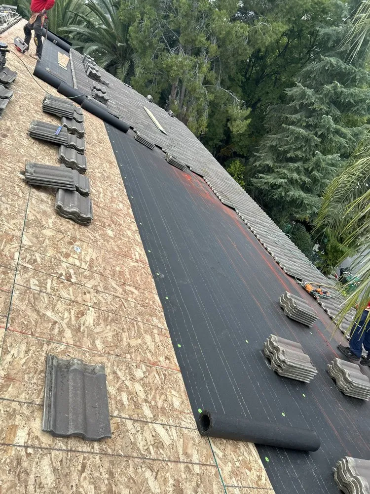 Slide of AVO Roofing Services