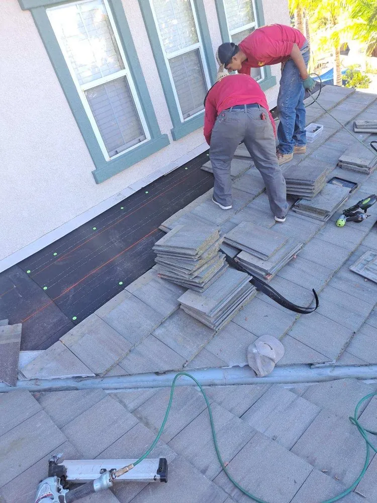 Slide of AVO Roofing Services