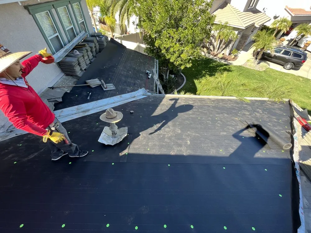 Slide of AVO Roofing Services