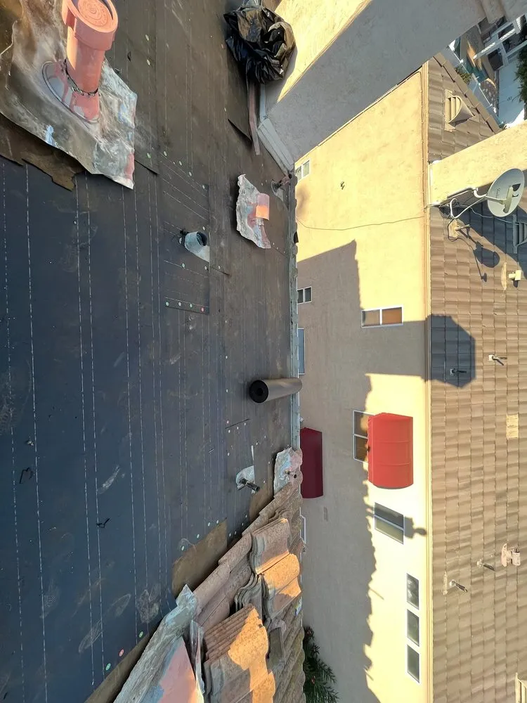 Slide of AVO Roofing Services