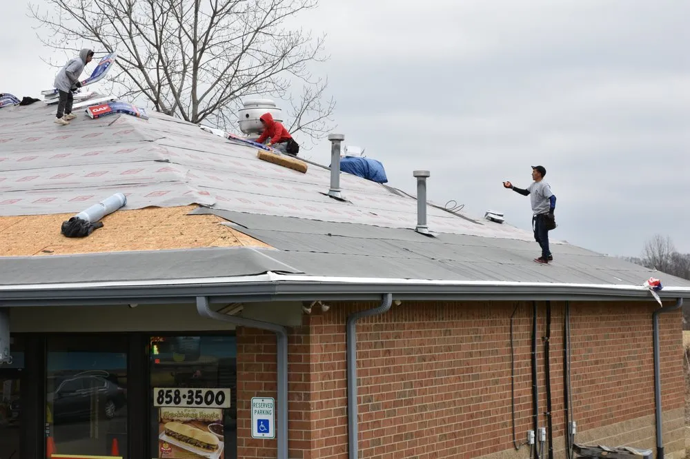 Slide of Avsten Roofing & Construction