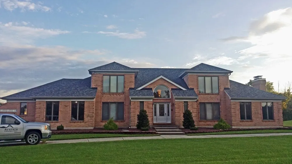 Slide of Avsten Roofing & Construction