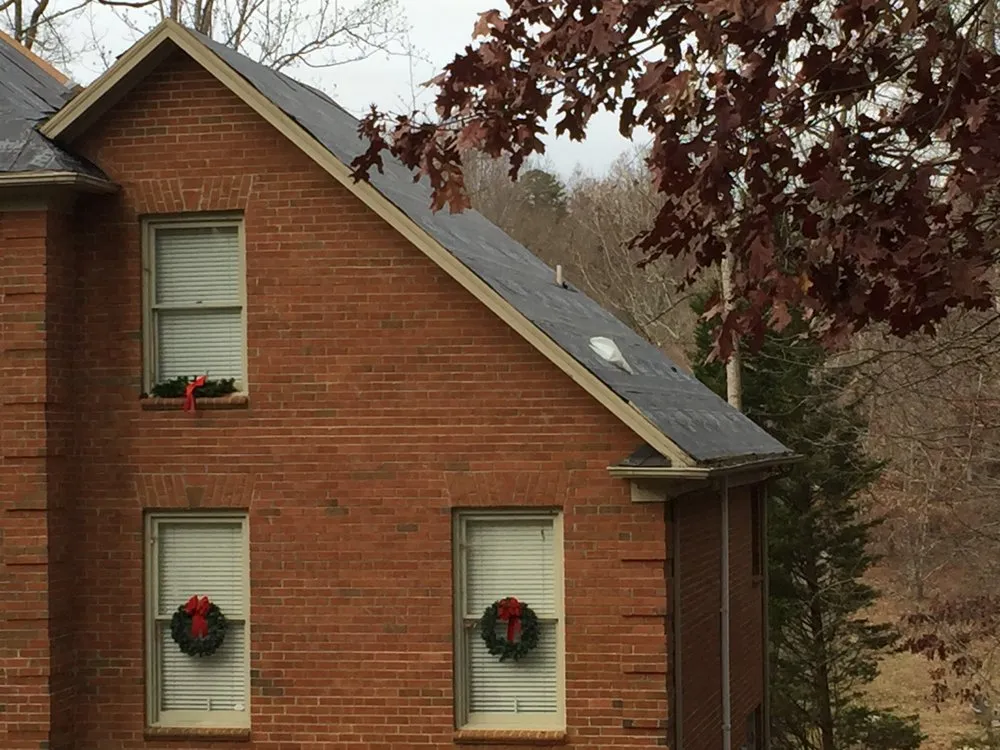 Slide of A&W Roofing