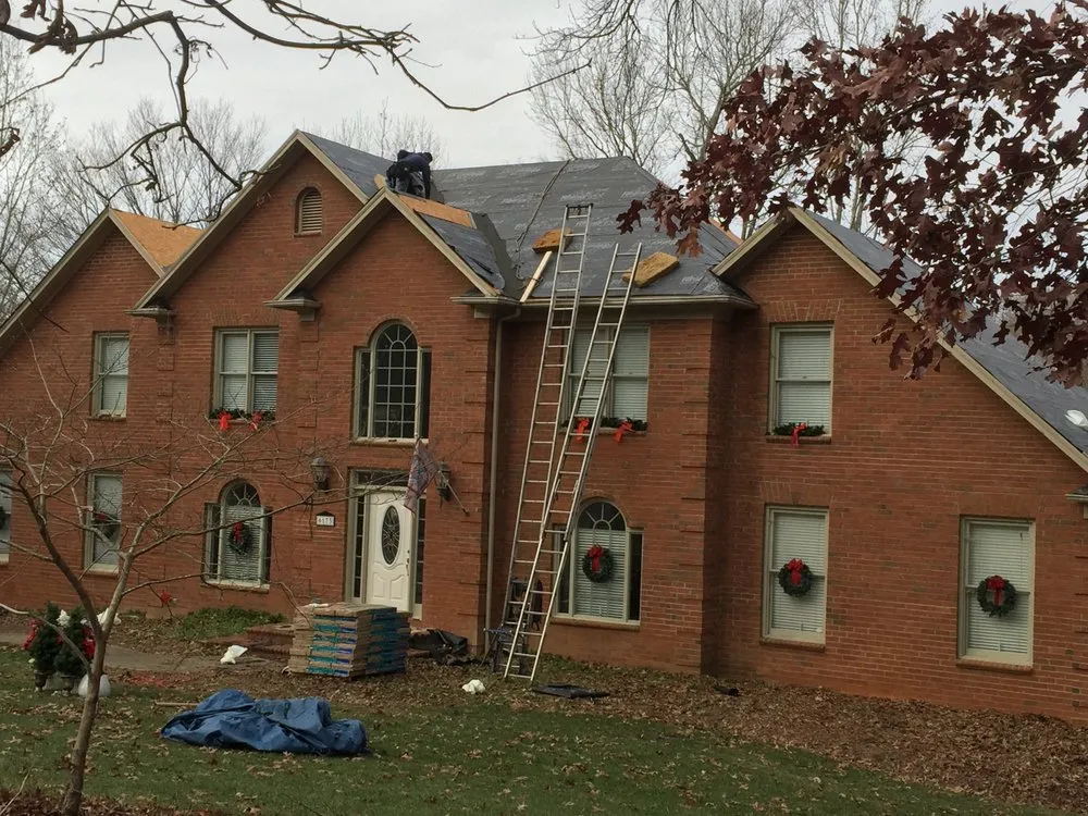 Slide of A&W Roofing