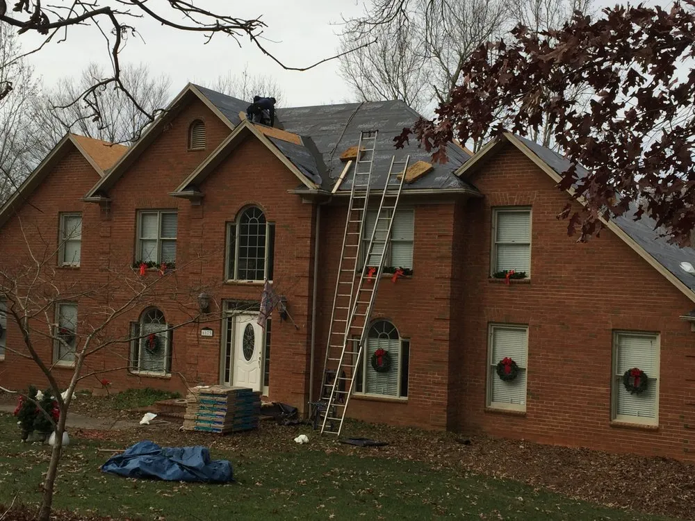 Slide of A&W Roofing