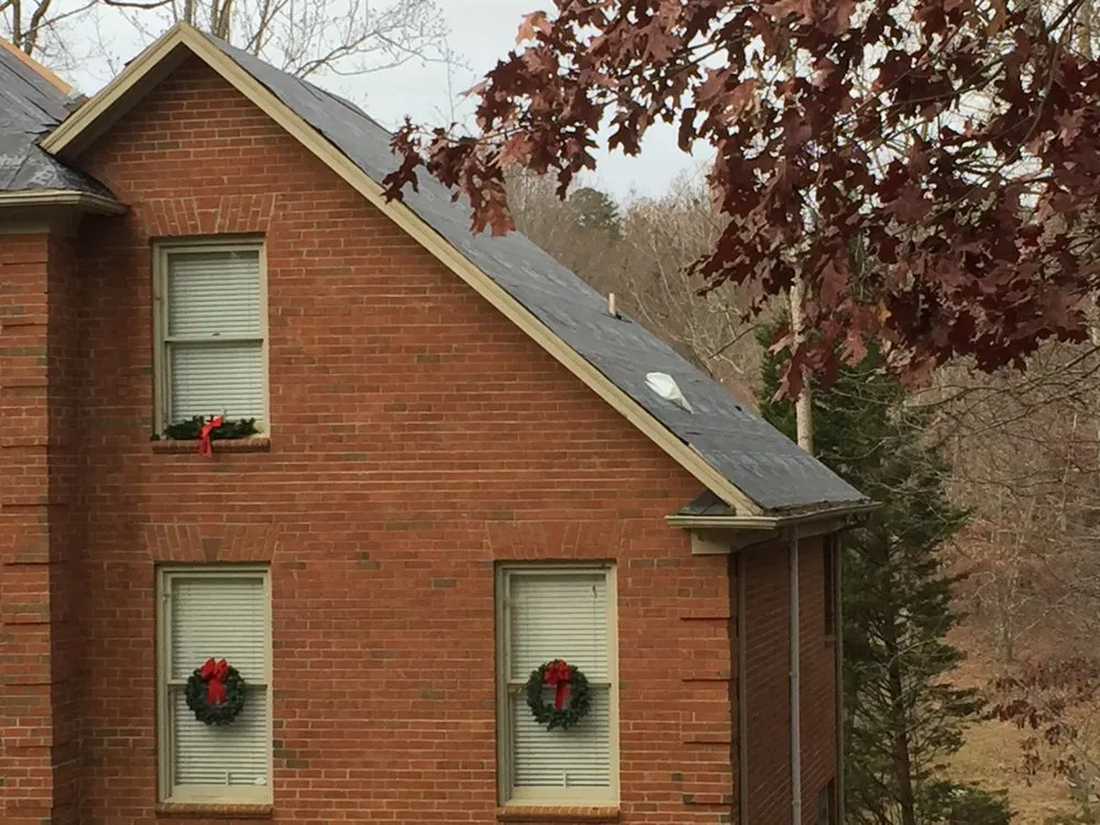 Slide of A&W Roofing