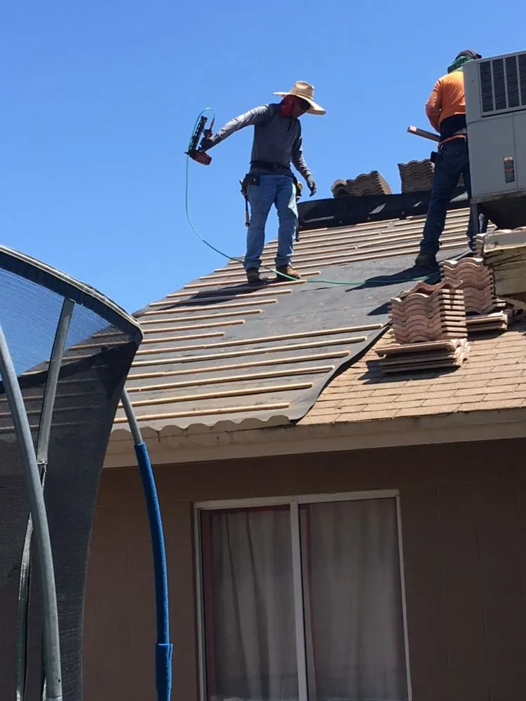 Slide of Awm Roofing