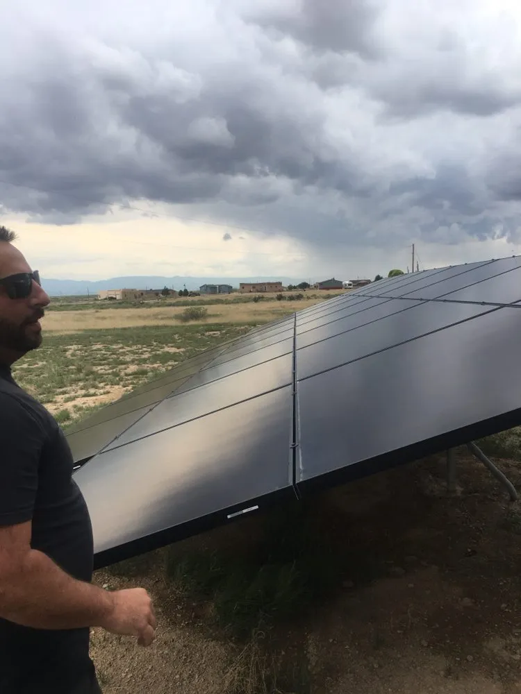 Slide of AX Solar & Roofing