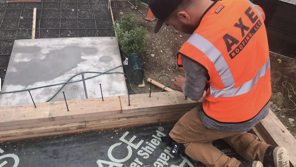 Slide of Axe Roofing