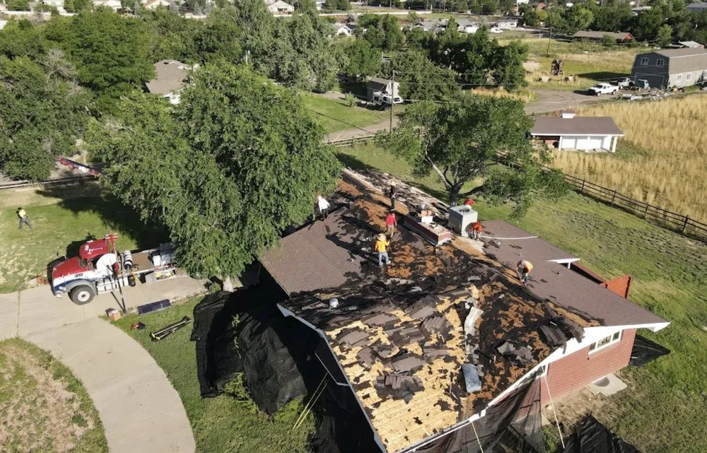 Slide of Axe Roofing