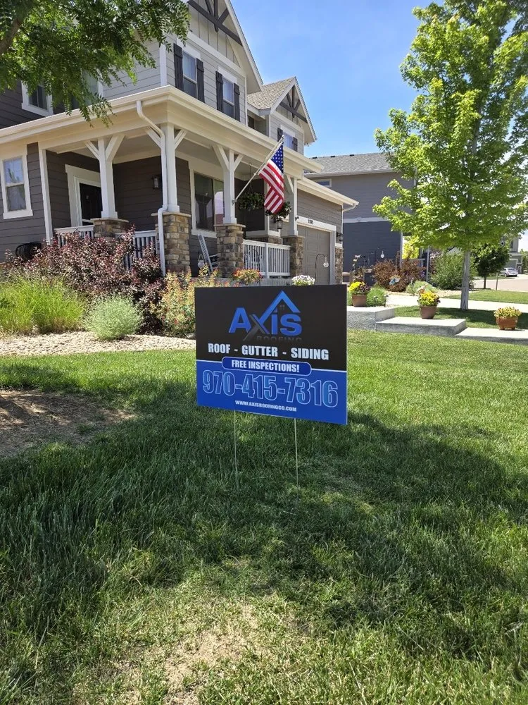 Slide of Axis Roofing