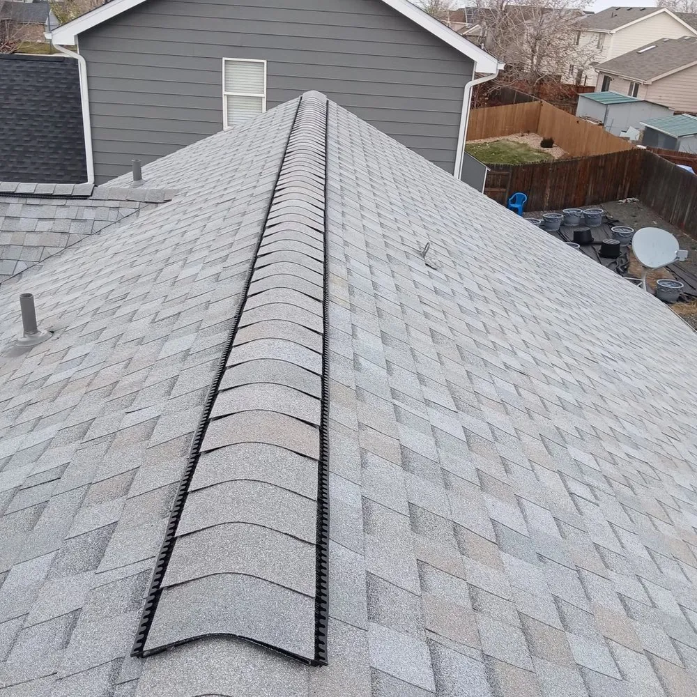 Slide of Axis Roofing