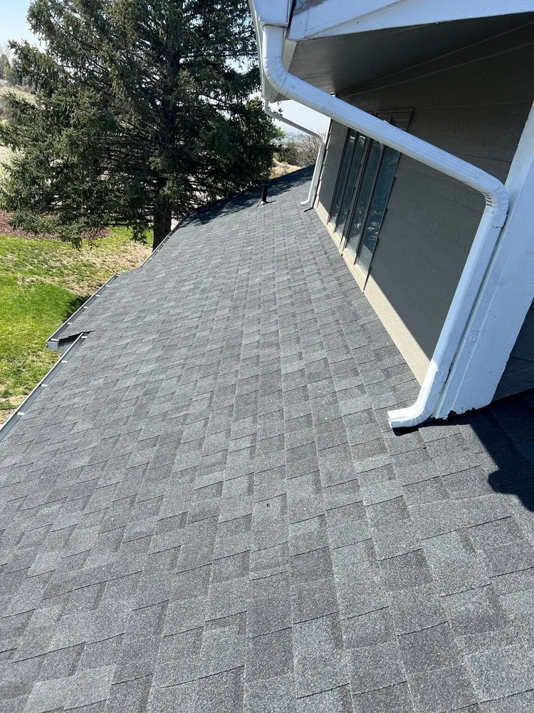 Slide of Axis Roofing