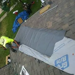 Slide of Axis Roofing