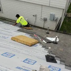 Slide of Axis Roofing