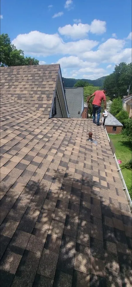 Slide of Ayala Roofing