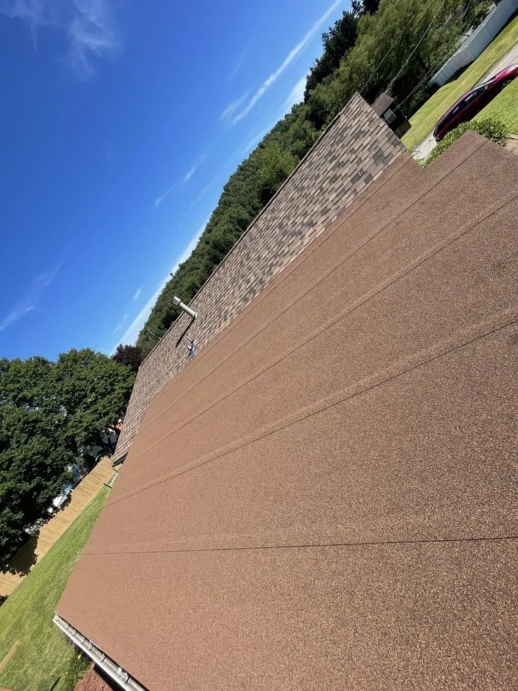 Slide of Ayala Roofing