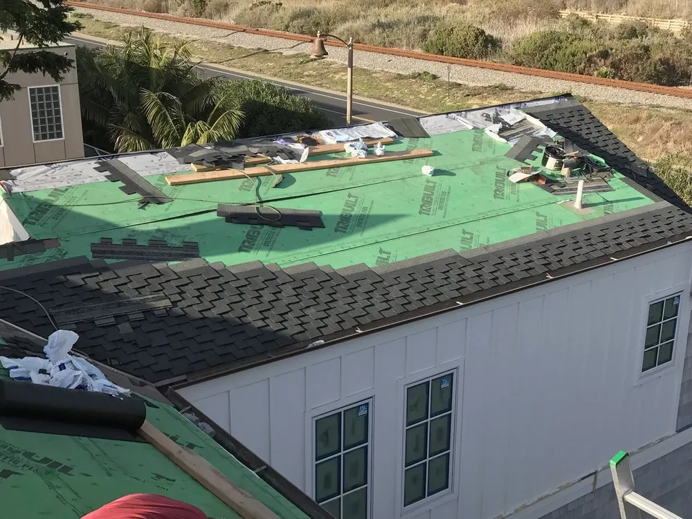 Slide of Aztec Roofing