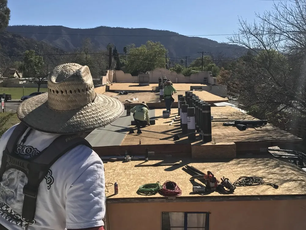 Slide of Aztec Roofing